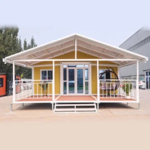 Maison extensible de 9 mètres (30 pieds) avec planche à sculpter en métal jaune et terrasse