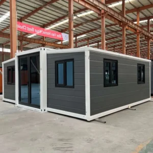 Maison extensible de 6 mètres (20 pieds) avec revêtement extérieur gris, deux chambres et une salle de bain