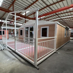 Maison extensible de 9 mètres (30 pieds) en briques jaunes avec terrasse